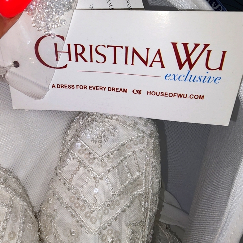 Wedding dress never worn other than to try on. Size 12